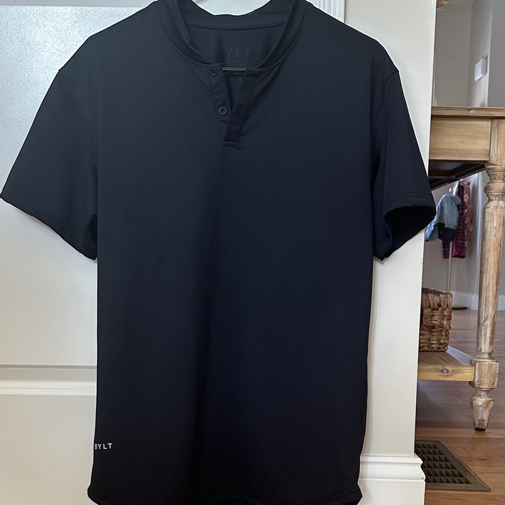 Men's BYLT Blue Medium Drop Cut Stealth Performance Golf Polo.
